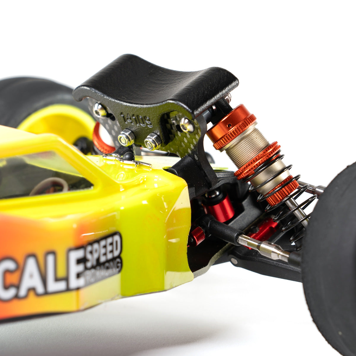 Rear-side view of BHC-1 front shock area showing nylon shock tower protector installed