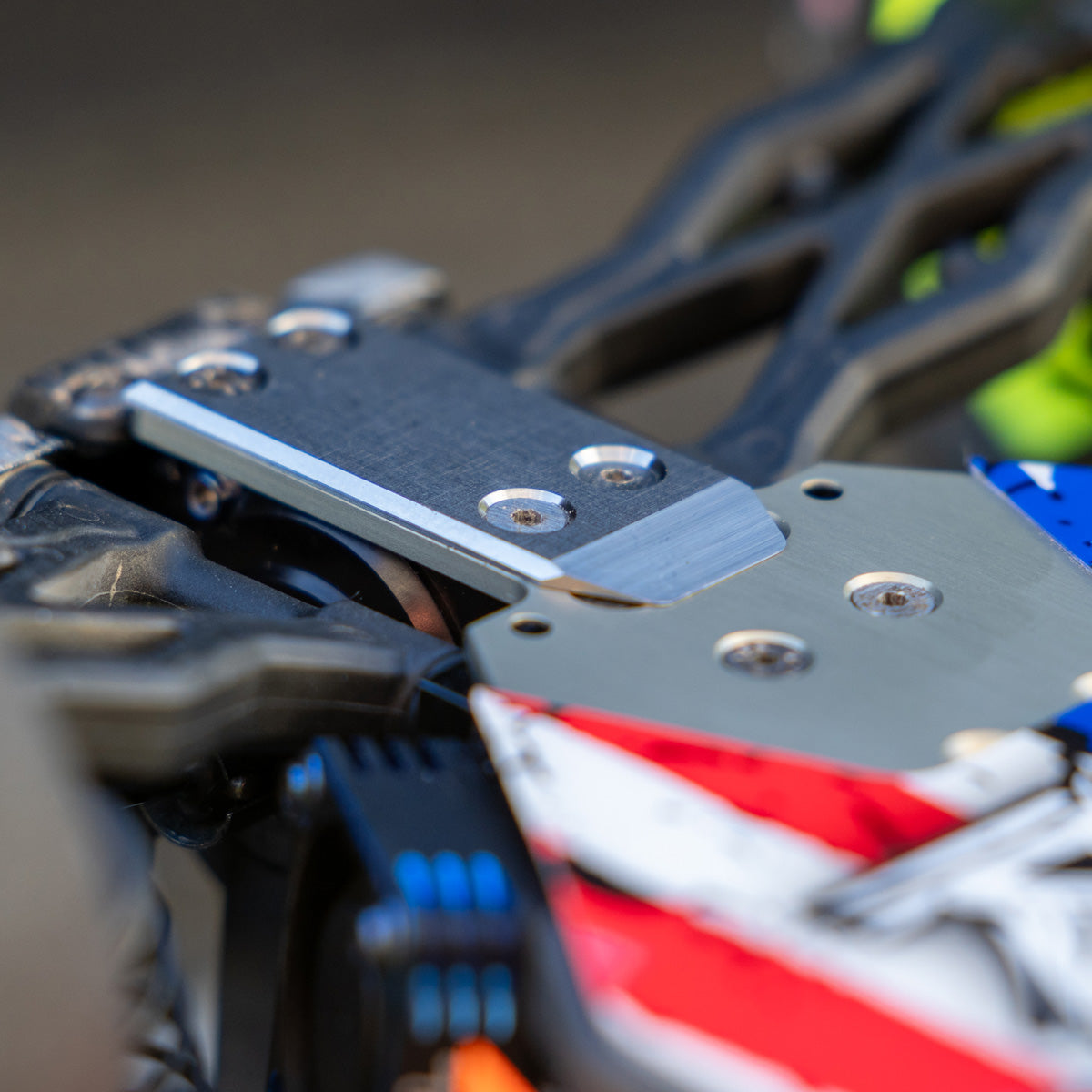 Associated B7 titanium skid plate installed